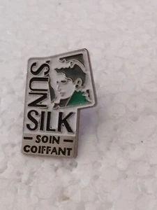 Pin's Pins Pin Société Soin COIFFANT "SUN SILK" - Picture 1 of 2