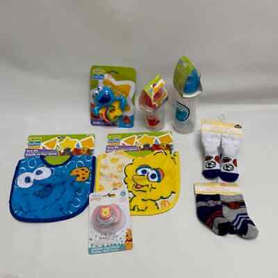 Lot 8 New Baby Gift Items Sesame Street Bottles, Bibs, Socks, Binkie • 13.76$