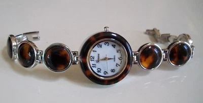 Reloj informal de moda de alta calidad con caparazón de tortuga sintético para mujer Foto 1 de 4