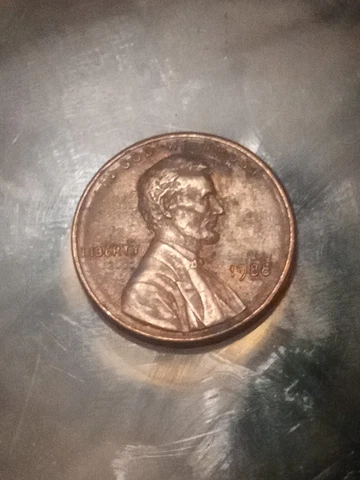 1988 no mint mark Lincoln penny with error Cover