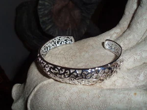 Bellissimo bracciale in argento a forma di trama cava - Foto 1 di 4