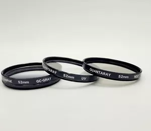 LOT OF 3- 52MM FILTERS UV, CIR POLARIZER , ND2 AND INCLUDES 4 CASES. - Picture 1 of 2