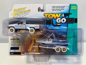 1/64 Johnny Lightning 1985 Toyota SR5 Pickup with Malibu Model JLSP399 - CHASE - Bild 1 von 1