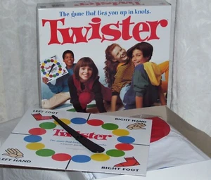 In the Box - Twister Fun w/ Family & Friends Game by Hasbro / 2 - 4 Players  - Picture 1 of 3