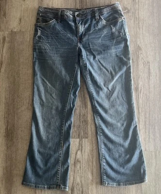 Pantalones de mezclilla 575 acampanados capris lavado medio para mujer talla 29 desgastados tiro bajo Foto 1 de 4