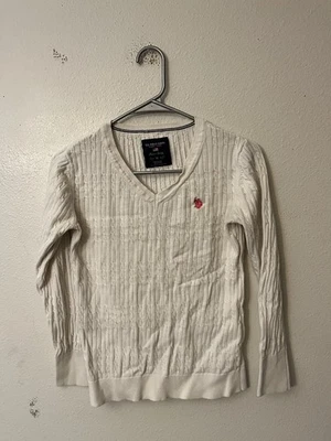 Suéter US Polo ASSN Blanco Tejido con Cable Sólido Cuello en V Para Mujer Mediano Foto 1 de 4