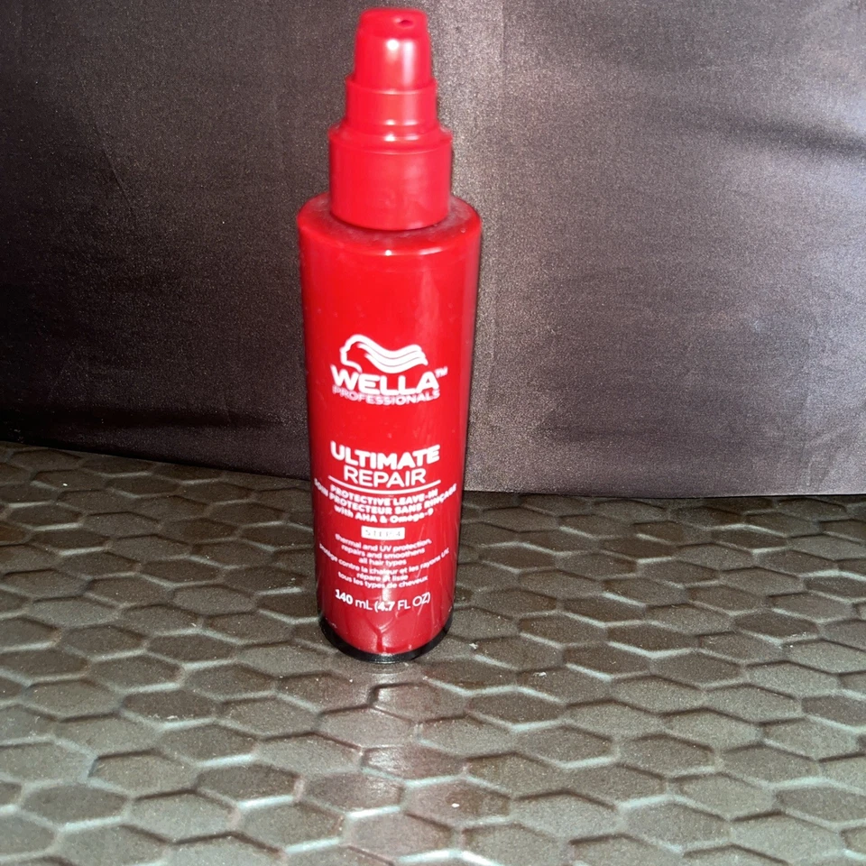 Tratamiento protector sin enjuague Wella Ultimate Repair, 4,7 oz, PASO 4 USADO  Foto 1 de 1
