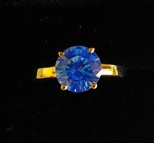 BRIGHT BLUE TOPAZ ENGAGEMENT RING
