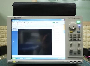 Tektronix TLA7012(opt 18, STD) Logic Analyzer with Module TLA7BB2(opt 4S) - Picture 1 of 3