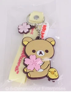 Rilakkuma Korilakkuma FLOWER SAKURA KEYCHAIN Yellow Band Round1 One San-X NEW - Imagen 1 de 5