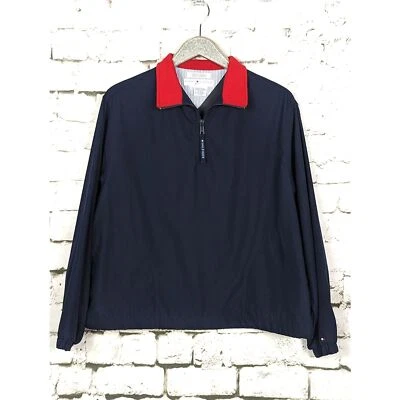 Pullover cortavientos Tommy Hilfiger Golf 1/4 cremallera azul marino bolsillos deportivos grandes  Foto 1 de 4