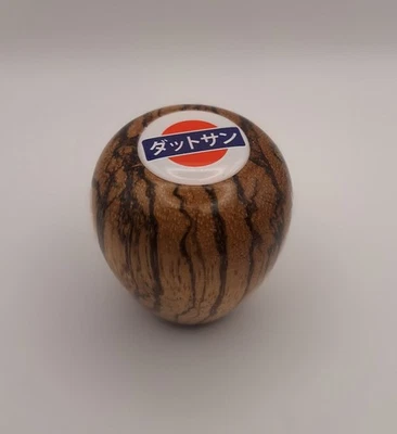  Pomo de cambio redondo Nissan 240SX, 300ZX, 350Z, 370Z M10x1,25 roscas madera de cebra Foto 1 de 4