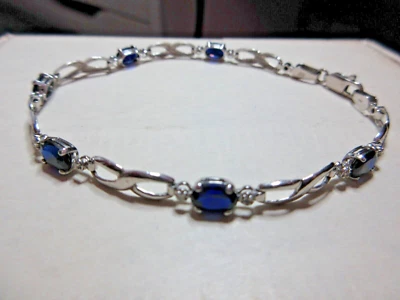 DESLUMBRANTE Brazalete de Eslabones de Piedras Facetadas Ovaladas de Zafiro Oro Blanco 10k México 7.25" Foto 1 de 4
