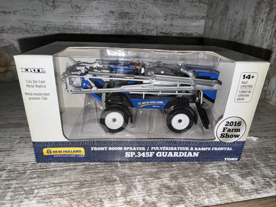 1/64 New Holland Sp.345F Guardian Front Boom Sprayer 2016 Farm Show - Image 1 of 4