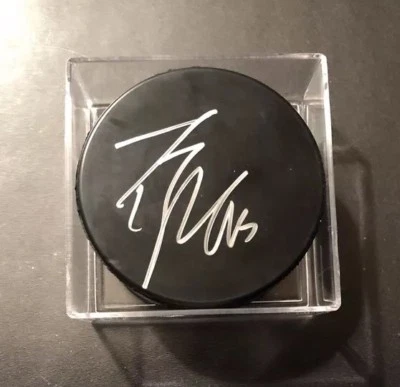 Disco de práctica autografiado por Travis Zajac New Jersey Devils Isleños retirados Foto 1 de 2