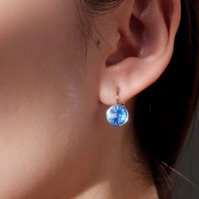 Silver platinum made with SWAROVSKI crystal light blue round classic earrings - image 1 of 4