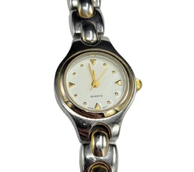 Reloj analógico de cuarzo para mujer tono plateado con correa con cierre a presión Foto 1 de 4