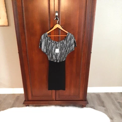 Bebe NWT's Women's Size M Silk & Spandex Blend Polka Dot Mini Dress Black/White - Image 1 of 4