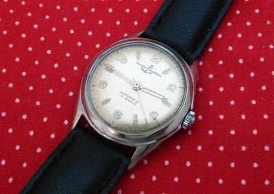 Ulysse Nardin años 60 elegante esfera dorada 31,5x38 mm caja automática recién reparada Foto 1 de 4