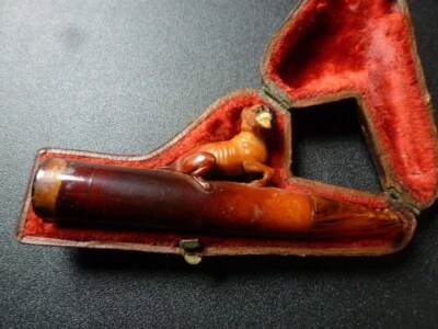 ANTIQUE AMBER CIGAR CIGARETTE HOLDER WITH CARVED AMBER BULLDOG + CASE - Image 1 of 4