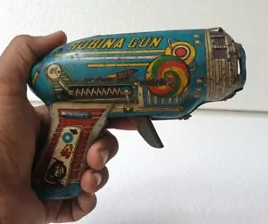 Giocattolo di latta antico vecchio da collezione che giocano rubina fuoco scintillante pistola Giappone? - Foto 1 di 8