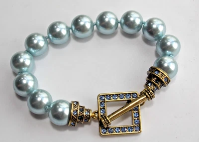 HEIDI DAUS CN PULSEIRA ALTERNADA AZUL BEBÊ CONTAS E CRISTAL ASSINADA - Imagem 1 de 4