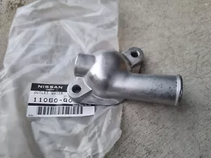 Nissan B110 Sunny 2 bolt thermostat housing NEW Datsun 1200 11060-G0300 - Picture 1 of 3