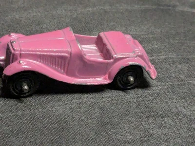 Coche diecast vintage TootsieToy rosa MG TF Roadster Chicago EE. UU. M.G. Gancho de remolque... Foto 1 de 4