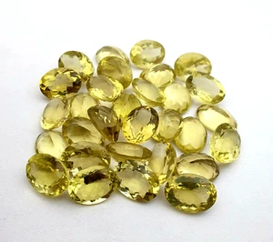 Lote de 12 piedras preciosas sueltas de cuarzo de limón natural corte ovalado 12 piezas 12x16 mm 100 quilates - Imagen 1 de 4