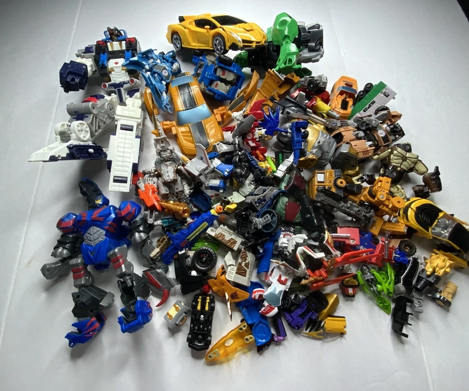Huge Transformers Lot Incomplete Parts Pieces Multiple Generations Weapons Set - Image 1 of 4