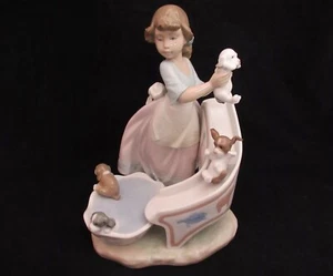 Lladro *******-Cachorros en un tobogán acuático, retirados como nuevos - Imagen 1 de 9