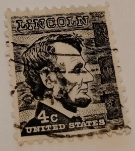 Vintage Abraham Lincoln 4 Cent Black Stamp - Picture 1 of 5