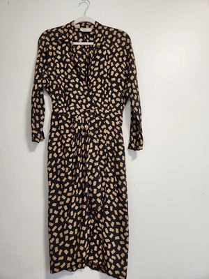 Vestido de seda negro con estampado abstracto dorado Foto 1 de 4