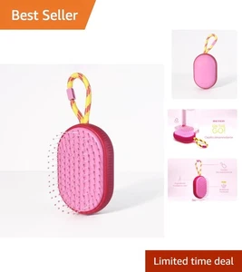 Sustainable Travel Hairbrush - Pink Detangling Brush with Flexible Bristles - Picture 1 of 6