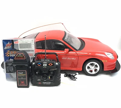 New Bright RC 1/6 Scale Red Porsche 911 Turbo w/ Remote Charger & Battery - Image 1 of 4