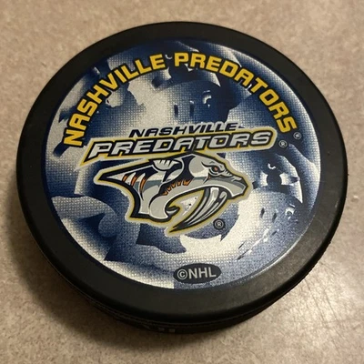 NHL Nashville Predators Team Logo Official Souvenir Hockey Game Puck - Image 1 of 4
