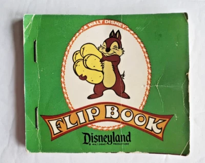 A Walt Disney Flip Book Disneyland Chip  - Image 1 of 2