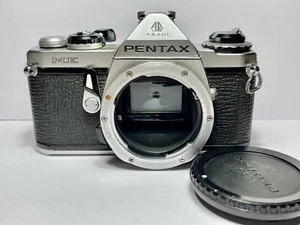 Reflex Argentique MF Asahi PENTAX ME 35mm Film SLR Camera + BOUCHON - Picture 1 of 4