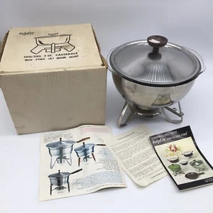 Plato de frotamiento de acero inoxidable Mid Century Dolfin perilla de madera caja original inserto Pyrex - Imagen 1 de 9