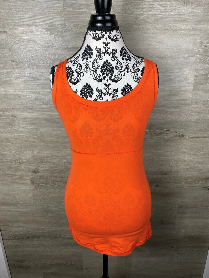 Camiseta sin mangas LUCY cuello redondo naranja ropa deportiva para mujer talla XS Foto 1 de 4