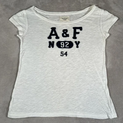 Camiseta gráfica Abercrombie & Fitch para mujer pequeña blanca manga corta Nueva York Foto 1 de 4