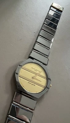 Raro Reloj Baume & Mercier Avant Garde Hombre Dorado y Tungsteno Ultra Delgado Foto 1 de 4