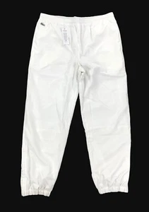 NUOVI pantaloni Lacoste Sport Poliestere Track da uomo abbigliamento attivo bianchi XH120T - Foto 1 di 10