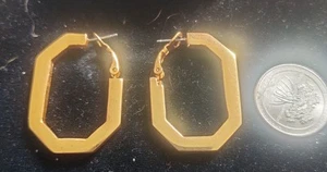 Pendientes perforados Oscar de la Renta de lujo tono dorado - Imagen 1 de 4