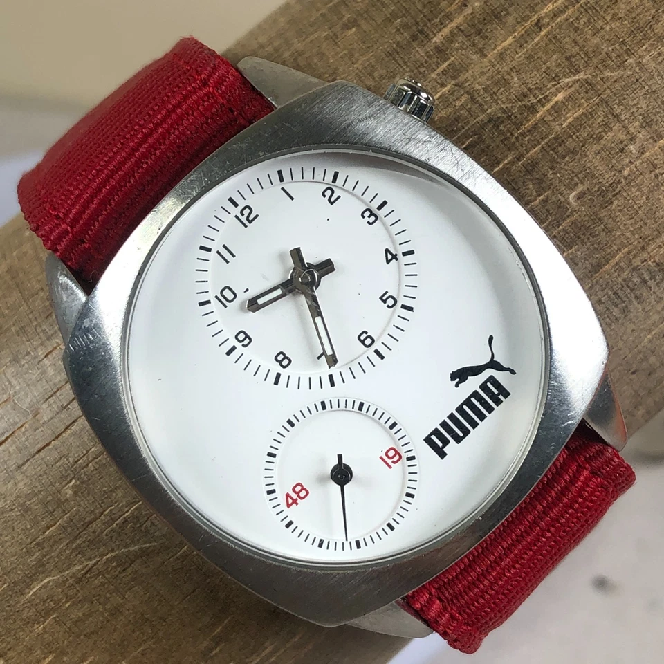 Reloj Puma Hombre PM500 Tono Plata Redondo Rojo Nylon Cuarzo Analógico 37mm 7 1/4" Foto 1 de 4