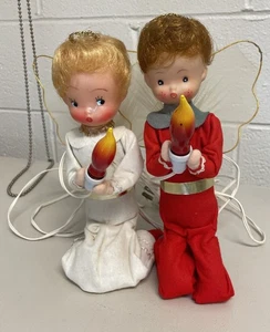 Ángel arrodillado vintage de Navidad Japón sosteniendo vela de llama encendida niño niña - Imagen 1 de 4