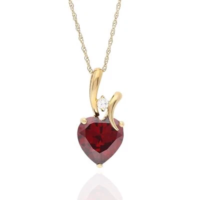 Colgante de piedra de nacimiento de circonita cúbica de oro amarillo de 14 quilates con forma de corazón de 0,53" Foto 1 de 4