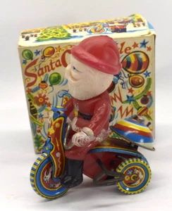 Juguete de cuerda de hojalata vintage de Papá Noel vacaciones de Navidad coleccionable Japón - Imagen 1 de 8
