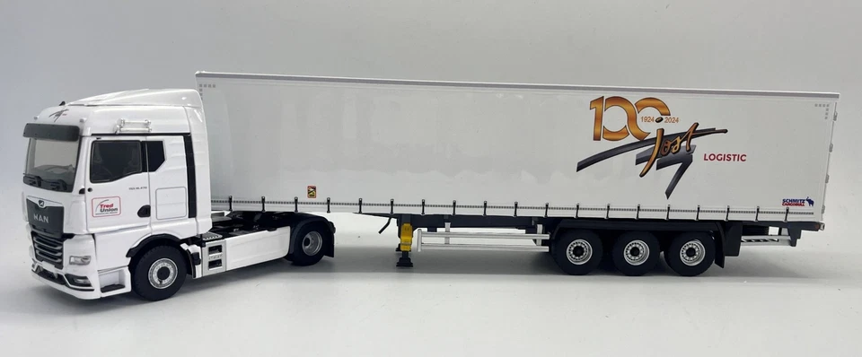 ELIGOR,MAN TGX GM 4x2 avec remorque bâchée 3 Essieux - JOST LOGISTICS - 100 a... Foto 1 de 1