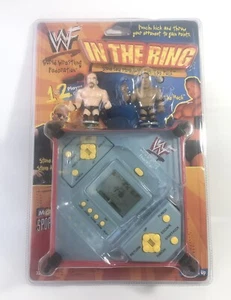 WWF In The Ring Stone Cold Steve Austin VS The Rock Electronic Handheld Game New - Picture 1 of 7